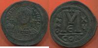 Antike Münzen FOLLIS JUSTINIEN I 527-565 EN BRONZE FRAPPE A CONSTANTINOPLE AN 15 (541/2) A/ D N IVSTINIANVS PP AVI R/ GRAND M ENTRE A/N/N/O ET X/4 -