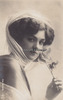 Deutsches Reich Ansichtskarte/Postkarte/Frauenportrait/Frau mit Blume -