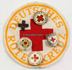 Bundesrepublik Deutschland Konvolut von 5 Abzeichen und 1 Ärmelschild / Deutsches Rotes Kreuz (DRK) -