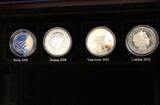 The World 1952-1912 60 years of Olympic commemorative silver coins, 25 coins in beautiful wooden box