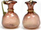  A Roman purple glass jug, ca. 4th century AD   