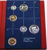Weltmünzen Netherlands Proof Set 5 Coins and a Mint    s Rijks Munt Utrecht Token 1982 PP Coins. In beautiful blue book with red velvet interior.