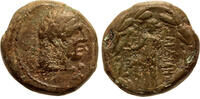 Greek AE 17mm Lydia, Sardeis, HEad of Heracles / Apollo standing -