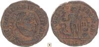 Roman Empire follis Licinius I., Radiate bust / Jupiter with captive, Alexandria -