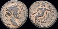 Cyrrhus AE23 Syria Cyrrhestica Cyrrhus Commodus AE23 Zeus Kataibates seated left on rock -
