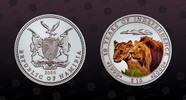 NAMIBIA 10 Dollars NAMIBIA , KM# 19 , Silver, 10 Dollars, 2000, Proof, 10 Years of Independence - Two multicolored Lions. Scarce coin in silver and -