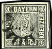 Bayern 1 Kreuzer schwarz, Platte 1, allseits voll- bis breitrandiges - links und rechts Schnittlinienteile - Kabinettstück, entwertet mit geschlossenem Mühlradstempel 350 - Tölz, signiert Pfenninger und Fotoattest P -