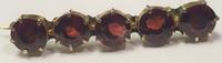 Brosche mit Granatsteinen 333er Gold 8 Karat -