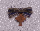 3. Reich 1933-1945 Ehrenkreuz der Deutschen Mutter in Bronze (Miniatur an Damenschleife)